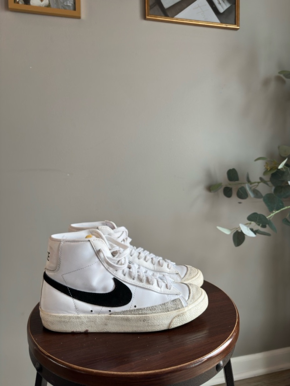 Nike White High-Top Sneakers with Black Swoosh